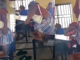Nigerian Student Stirs Reactions As She Climbs Chair To Speak After Lecturer Complains He Can't See Her (VIDEO)