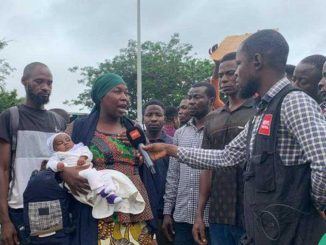 "Police Are Shooting Tear Gas At Us": Protesting Nursing Mother Cries Out at Eagle Square, Abuja