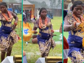 Bride dances during rainfall, doesn't allow anything to spoil her joy, Nigerians praise her