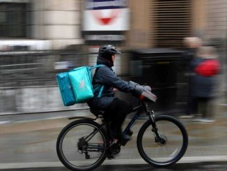 Deliveroo shares surge on 'profit milestone'