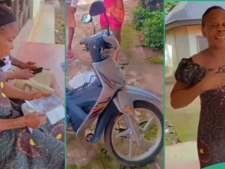 Nigerian Mother Happily Hugs Her Son Who Bought Her Brand New Motorcycle