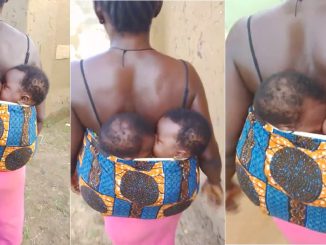 A woman both intrigues and angers the internet as she carries her twins on her back (VIDEO)