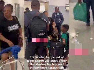 Lady tears husband's international passport to pieces after they arrived at Lagos airport