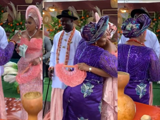 "The sh0ck on her face is priceless" – Adorable Moment Groom's Mother Surprised The Bride With 10 Bundles Of 500 Naira Notes On Wedding Day (VIDEO)