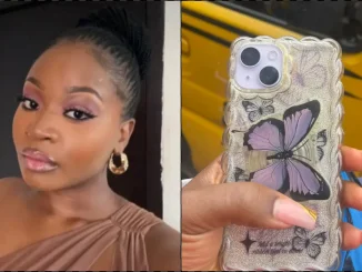 Lady praised for returning iPhone 14 found in bus to owner