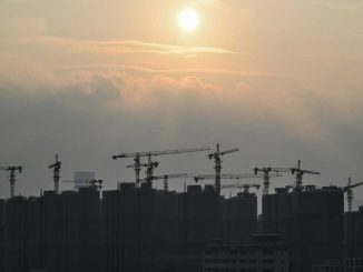 China admits economy facing new 'problems', vows to fix property sector