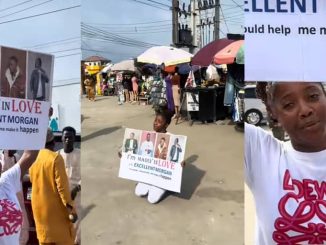 Nigerian lady raises eyebrows with a large poster professing her love for a man in Lagos