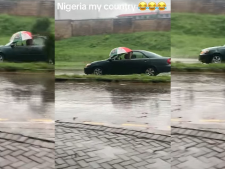 "The glass no fit wind up be that" – Driver refuses to close car window, opts for umbrella in heavy rain (VIDEO)