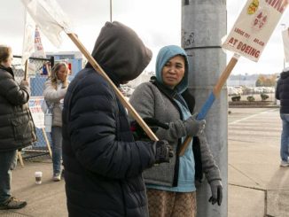 Striking Boeing workers aim to restore old retirement program