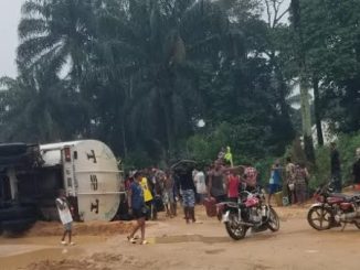 Youths risk lives to scoop fuel from fallen truck