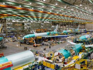 Boeing again raises offer to end strike, union to vote Monday