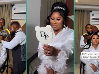Nigerian Groom Styles Bride’s Hair On Wedding Day, Netizens Hail His Hairstyling Skills