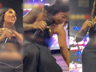Hilarious moment singer Tiwa Savage stores the dollar bill from a fan in her 'natural safe' (WATCH)