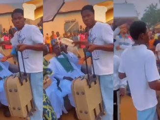 Man showers newlywed couple with 'loaves of bread' on their wedding day (VIDEO)
