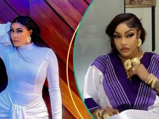 Angela Okorie Seen Covering Her Backside As She Goes Swimming in Raunchy Swimsuit, People React