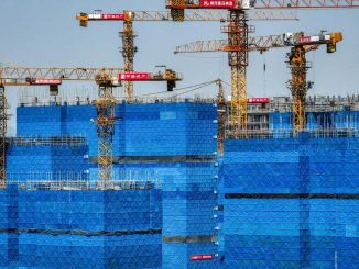 China's top leaders pledge economic support as trade war rages