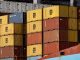 Bank of Japan holds rates, lowers growth forecasts
