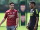 Jurrien Timber and Mikel Arteta